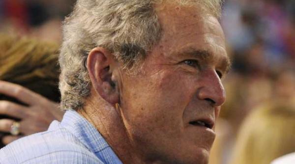 amnesty international cere arestarea lui george bush in canada