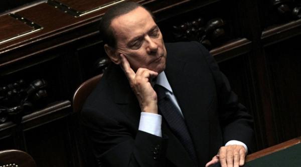 silvio berlusconi a adormit de doua ori in timp ce liderii lumii incercau sa i salveze tara