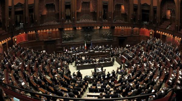 deputatii italieni au adoptat masurile economice promise uniunii europene urmeaza demisia lui berlusconi