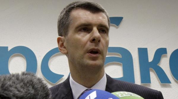 miliardarul prohorov contracandidatul lui putin vrea sa cumpere ziarul critic kommersant dupa demiterea redactorului sef