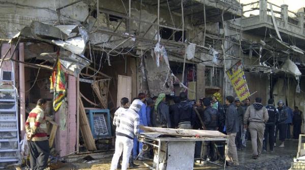 zi sangeroasa la bagdad 14 explozii s au soldat cu 60 de morti si aproape 200 de raniti