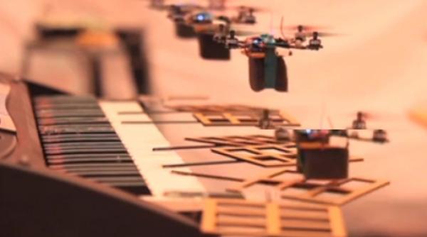 muzica din james bond interpretata de o armata de elicoptere robot video