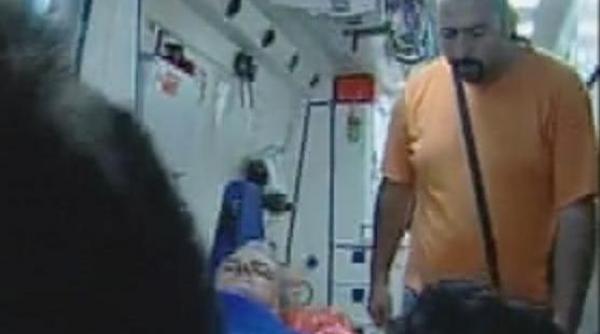 cine este individul in portocaliu din ambulanta lui nastase