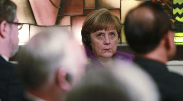 merkel atacata pentru imixtiunile in politica romaneasca
