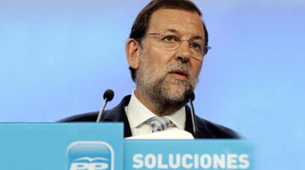 spaniolii si au retras banii din banci si fug din tara de frica crizei