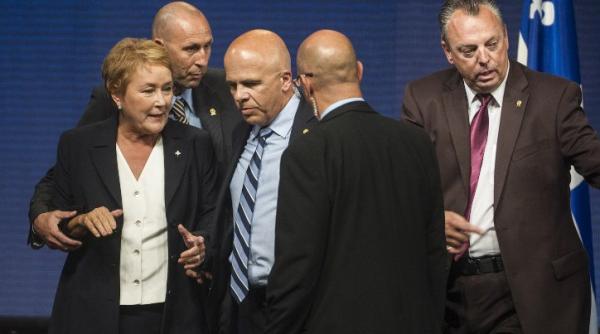 impuscaturi in timpul discursului noului premier separatist al quebecului o persoana a fost ucisa