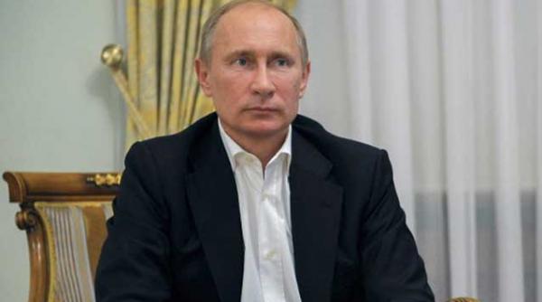 putin crede ca dosarul julian assange este unul politic