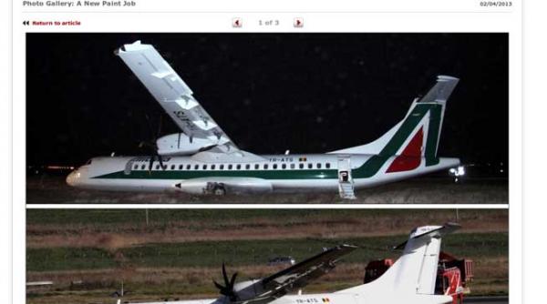 ciudat logo ul alitalia de pe avionul carpatair iesit de pe pista a fost acoperit cu vopsea