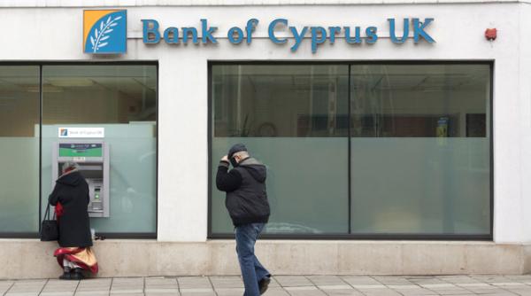 fitch ratings a retrogradat cyprus popular bank si bank of cyprus