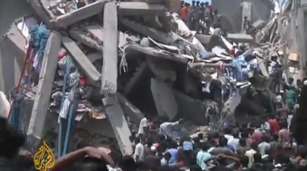 bangladesh salvatorii continua sa scoata la suprafata supravietuitori la 4 zile dupa ce o cladire cu opt etaje s a prabusit video