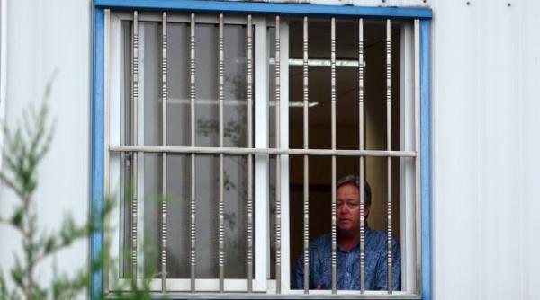 un american este tinut ostatic de sase zile de angajatii sai din china care vor sa fie concediati