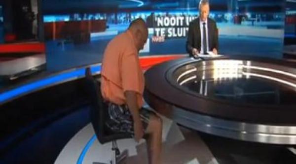 fostul premier belgian in sort la televiziune