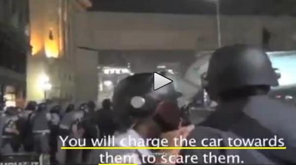 un ofiter ordona unui jandarm sa dea cu masina peste protestatari gestul jandarmului a facut inconjurul lumii video