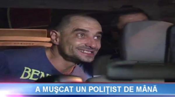 smecherul care a muscat de mana un politist si a spart geamul masinii de politie a fost lasat liber