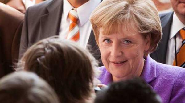 merkel si social democratii au ajuns la un acord vizand negocierea unei coalitii