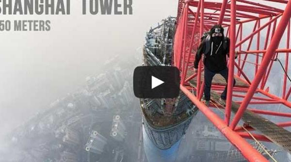 doi tacaniti au escaladat shanghai tower 650 de metri inaltime video