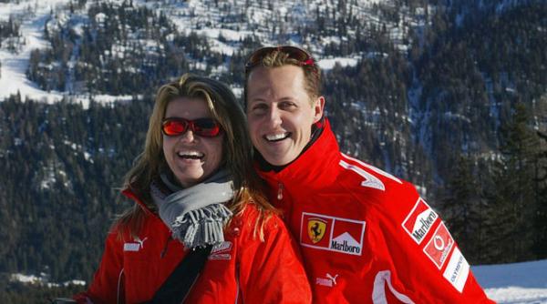 bild schumacher comunica din priviri cu sotia lui corinna dar si cu medicii