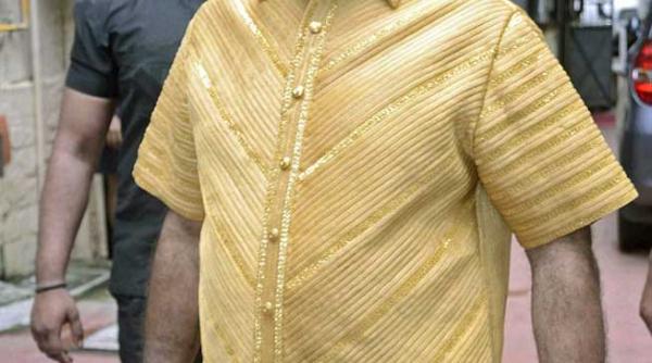 umbla cu patru bodyguarzi dupa el sa aiba grija de camasa lui din aur