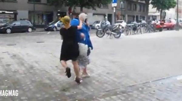 belgia maggie de block ministrul sanatatii atacata in public cu placinte video