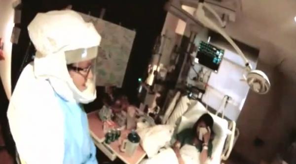 imagini cutremuratoare asistenta americana infectata cu ebola filmata pe patul de spital inregistrarea a fost postata pe youtube video