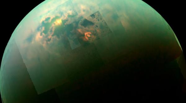 imagine fabuloasa nasa a surprins reflexia soarelui pe titan cel mai mare satelit natural al planetei saturn