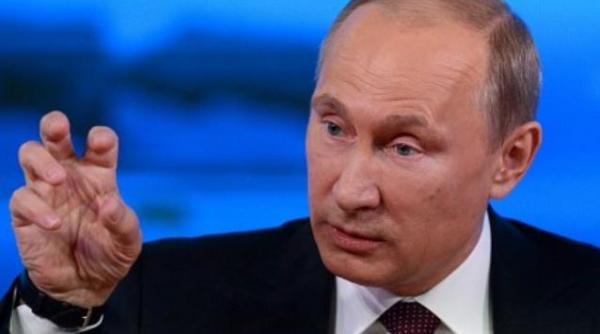 putin occidentul incearca sa puna ursul rus in lant si sa i smulga coltii si ghearele