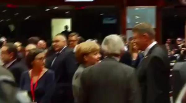 cum a facut o sobrul iohannis sa zambeasca pe angela merkel video