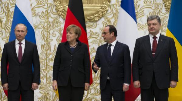 hollande putin merkel si porosenko sunt la paris discutii despre ucraina dominate de siria