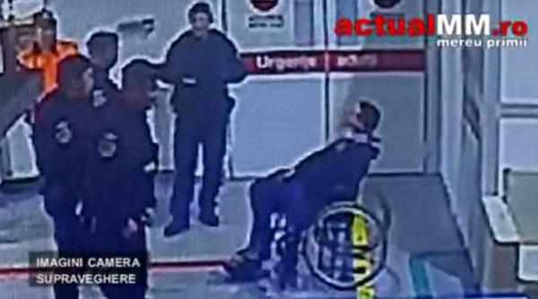 video doi indivizi beti s au urcat pe un acoperis unul a cazut in gol