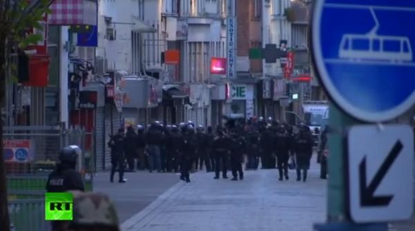 raidul antiterorist de la paris femeia sinucigasa care a detonat o vesta cu explozibil era o blonda caucaziana