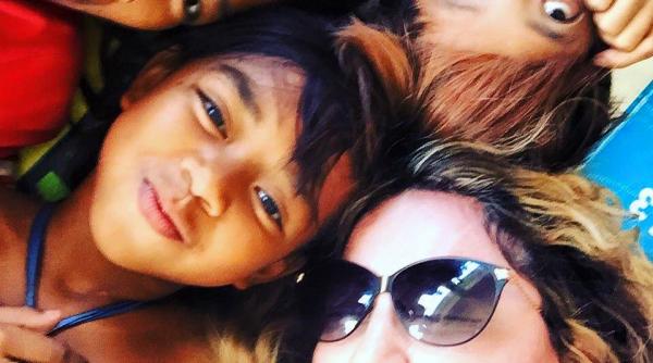 madonna a vizitat cateva organizatii caritabile inainte de concertele sale din manila