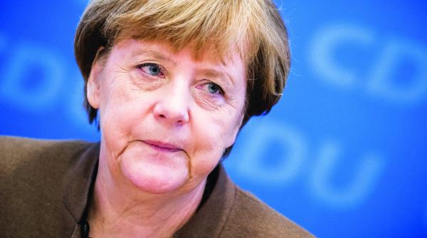 refugiatii o costa pe merkel la urne