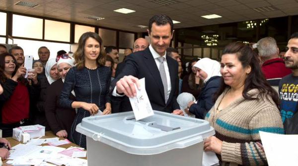 bashar si asma al assad au votat la damasc in scrutinul legislativ