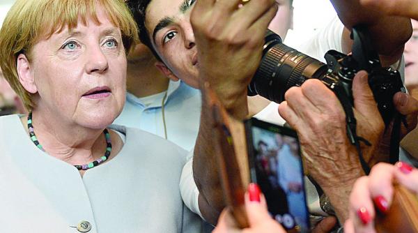 criza refugiatilor merkel vede erori