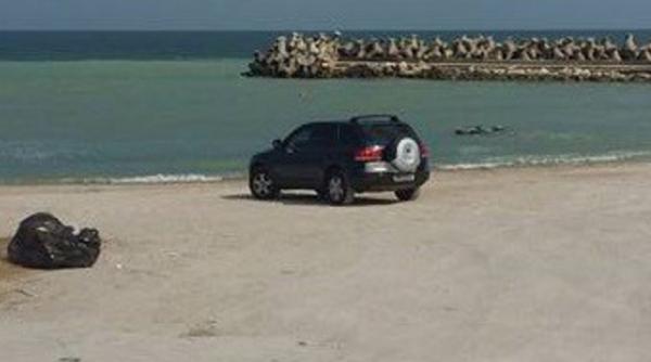 bolid cu numere ale ministerului afacerilor interne parcat pe plaja care a fost explicatia