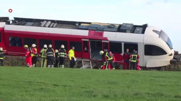 un tren deraiat in olanda dupa ciocnirea cu o cisterna care transporta lapte