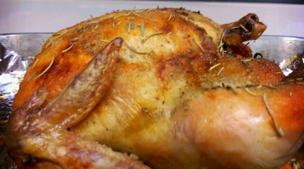 reteta zilei pui intreg la cuptor cu usturoi si lamaie