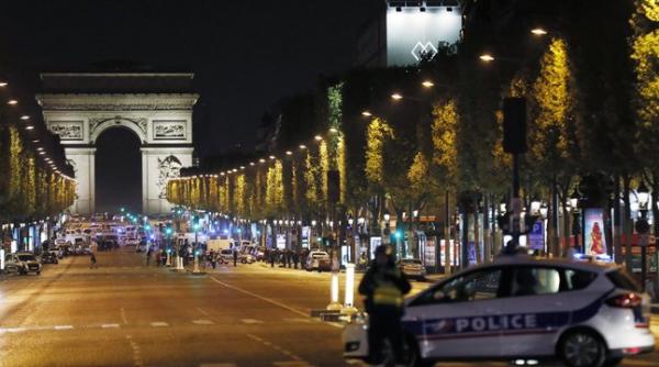 franta politia a arestat un suspect in legatura cu uciderea unui politist pe champs elysees