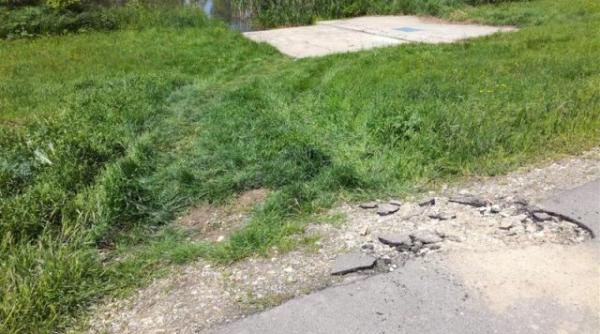 timis pista pentru biciclete si corpul digului de pe malurile canalului bega distruse de un sofer