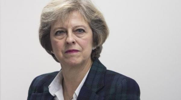 theresa may a folosit un limbaj licentios in timp ce se lauda pentru curajul de a organiza alegeri