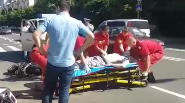 un motociclist a decedat dupa ce a fost acrosat de o masina a politiei