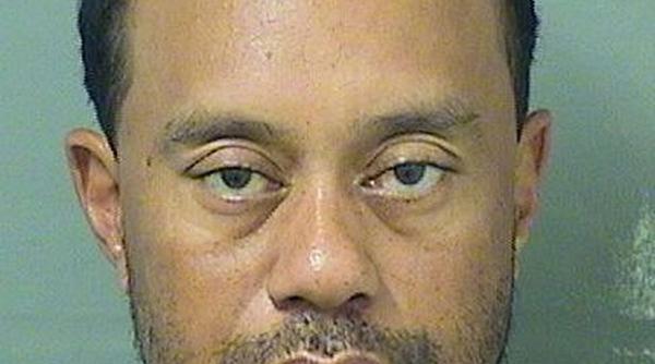 tiger woods retinut pentru ca a condus sub influenta drogurilor