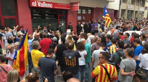perchezitii la o publicatie din catalonia suspectata ca ar fi tiparit buletine de vot