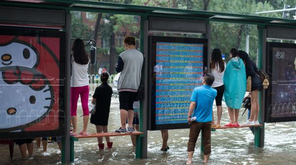 8 persoane au murit si alte 7 au disparut in urma ploilor abundente din china