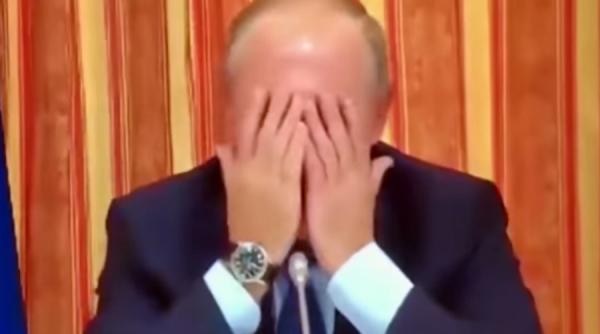 video putin rade copios in timpul unei intalniri oficiale