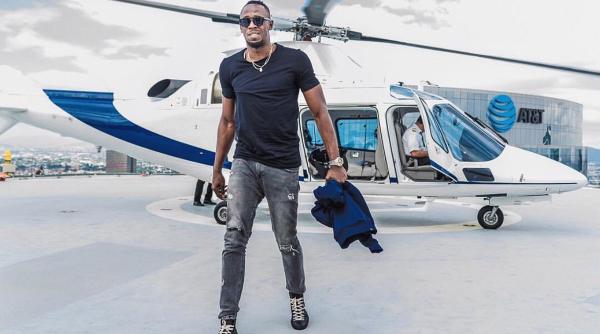 usain bolt invitat la borussia dortmund pentru a si demonstra calitatile de fotbalist