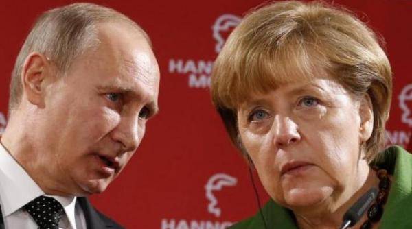 angela merkel si vladimir putin au convenit sa depuna eforturi in scopul intoarcerii observatorilor rusi in estul ucrainei