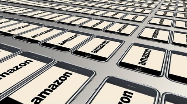 actiunile amazon depasesc pentru prima data pragul de 1 500 de dolari