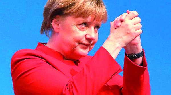 angela merkel scapa cu fata curata
