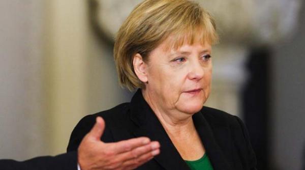 angela merkel anunta ca intentioneaza sa se intalneasca cu vladimir putin